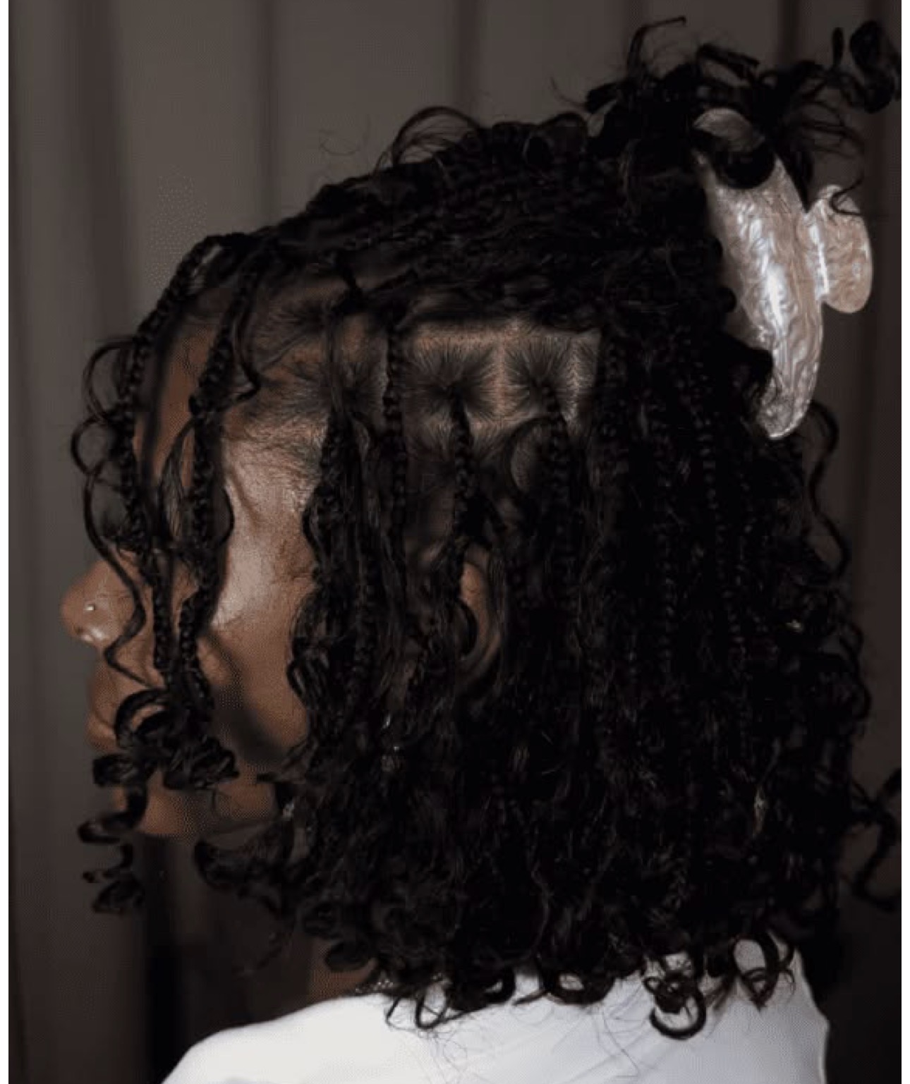 Boho knotless braids with curly human-hair accents, installed at The Braiders Lounge in Somerset, NJ.